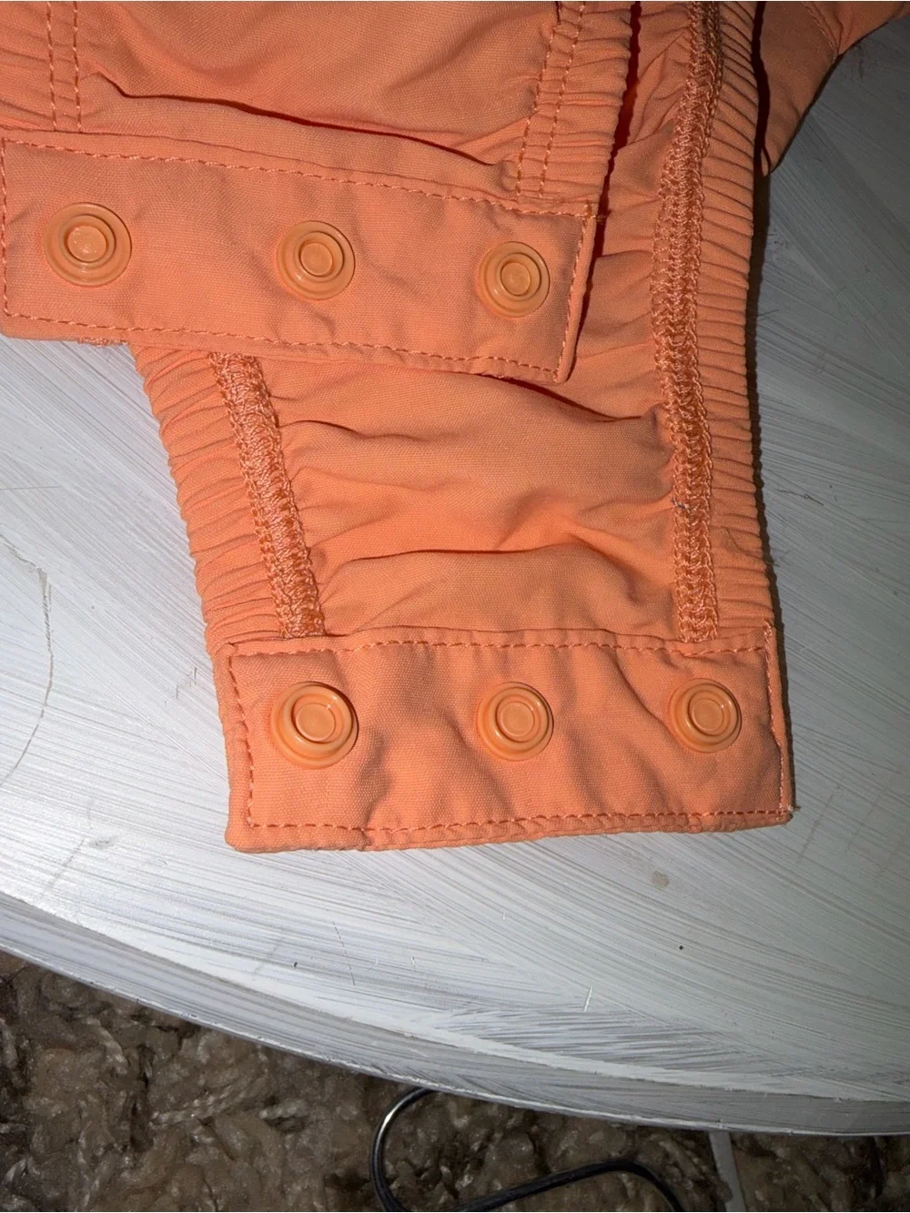 Magellan Outdoors Kids Peach-Orange Button Front One-Piece Bodysuit